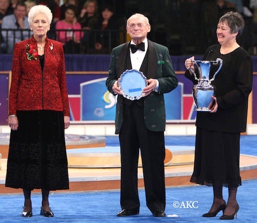 Receiving the Herding Group AKC Breeder of the Year Award for 2007. Walter Goodman and Patti Strand, presenters.